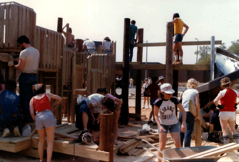 A photo documenting the construction of the Abingdon playground in 1985.